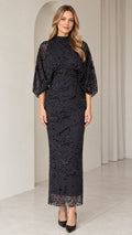 Front view of black mock neck beaded column evening dress with sheer dolman sleeves