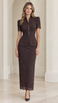 Front view of model wearing espresso brown floral lace peplum jacket and maxi skirt set