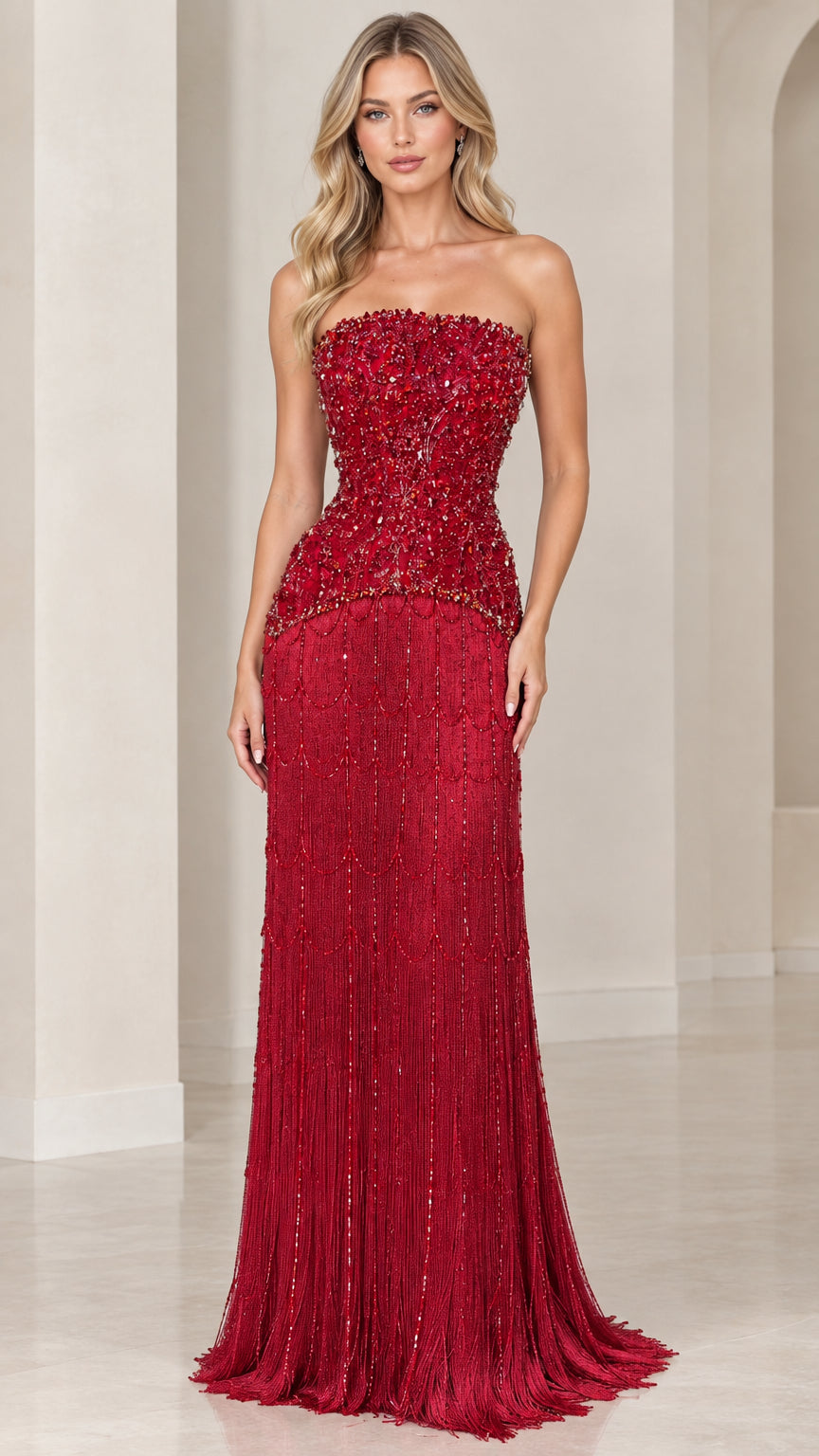 Front view of model wearing strapless ruby red beaded evening gown