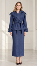 Front full-length view of women's denim blue trench-style belted jacket and maxi skirt set