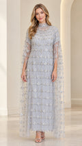 Front view of model wearing Ice Blue beaded high-neck evening gown with cape overlay