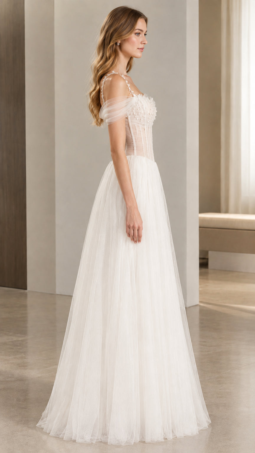 Side profile view of white corset tulle formal evening dress
