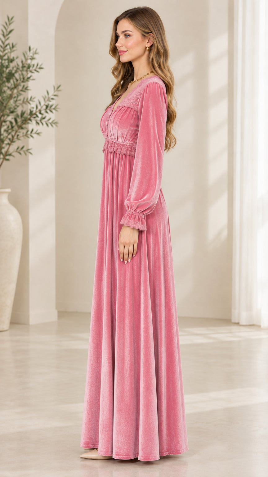 Side profile view of dusty pink velvet long sleeve maxi dress