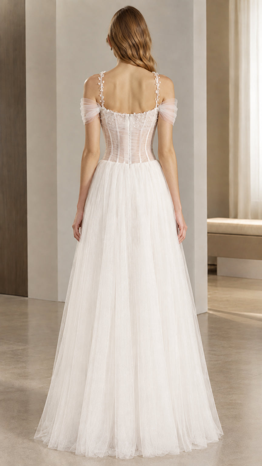 Back view of white sweetheart corset gown with tulle skirt
