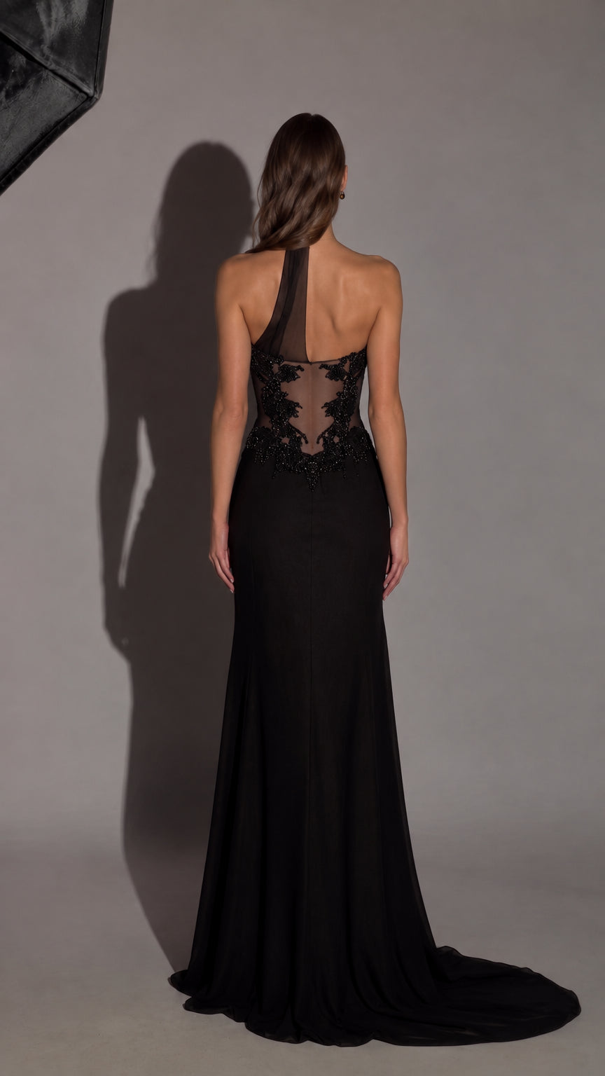 Back view of black asymmetric evening dress with sheer illusion back and train