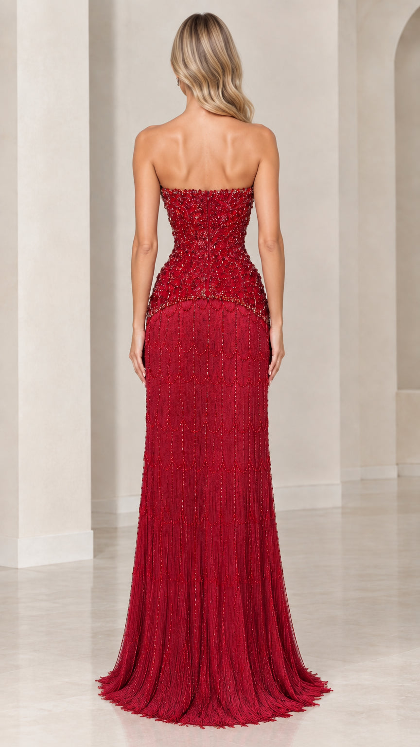 Back view of strapless ruby red evening gown showing fit and floor-length hem