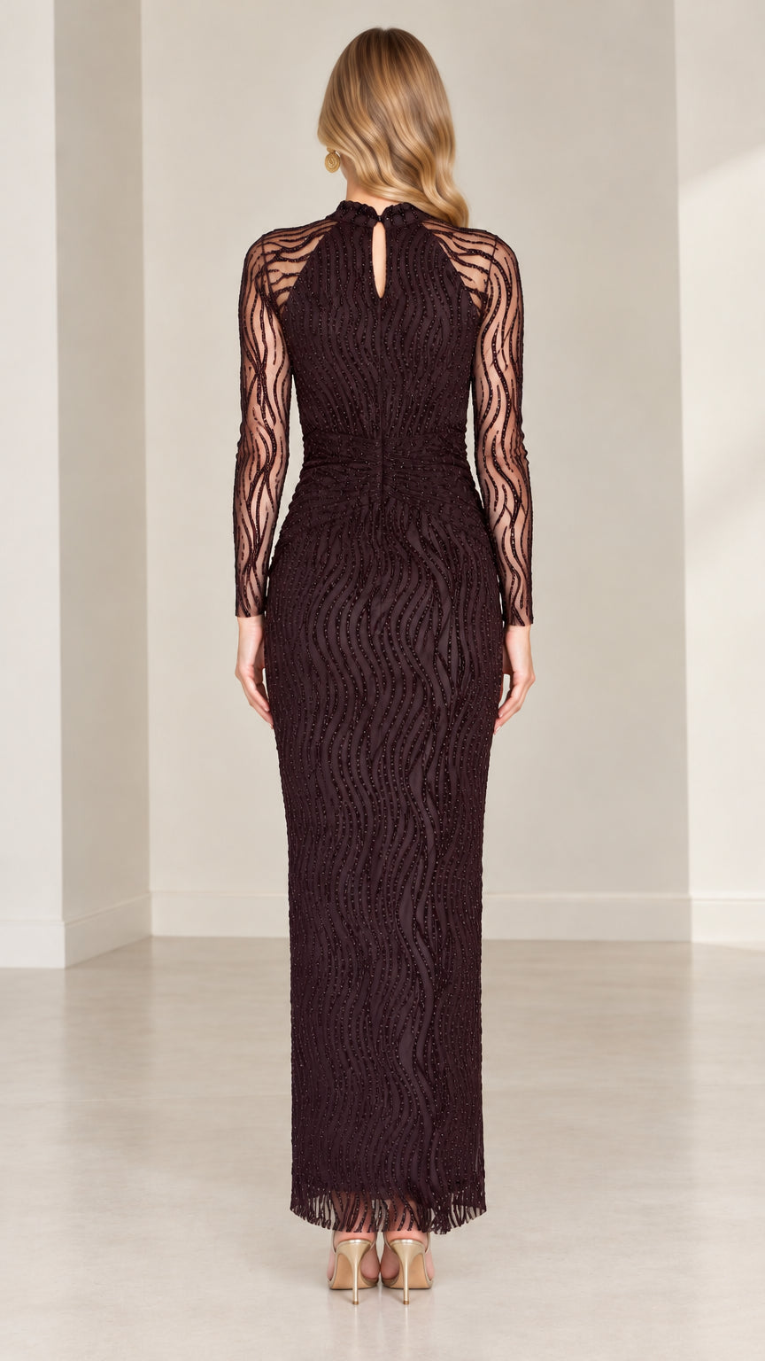 Back view of plum long sleeve formal maxi dress showing back keyhole detail
