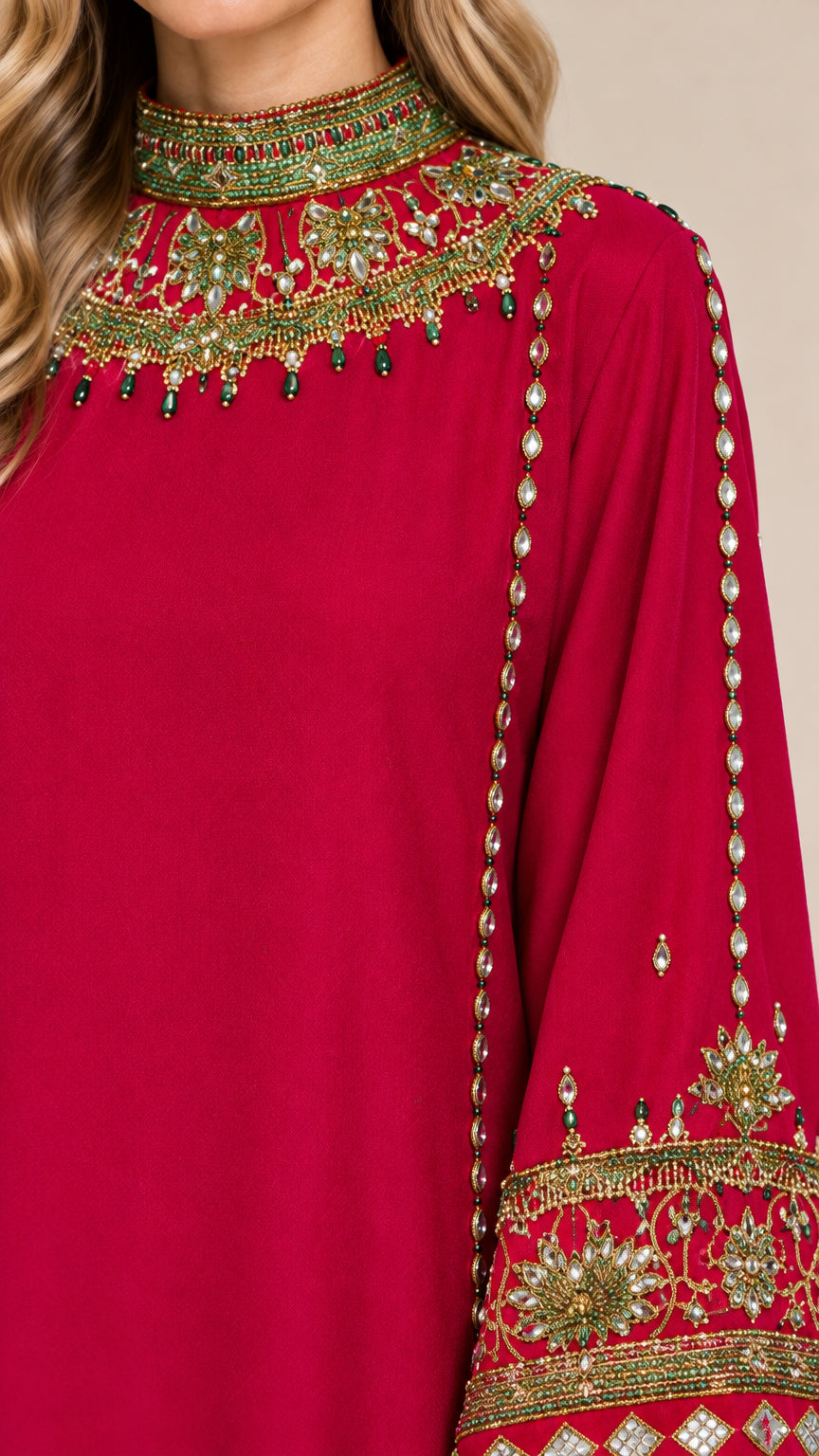 Close-up detail of ornate beadwork and embroidery on neckline and bell sleeve cuff