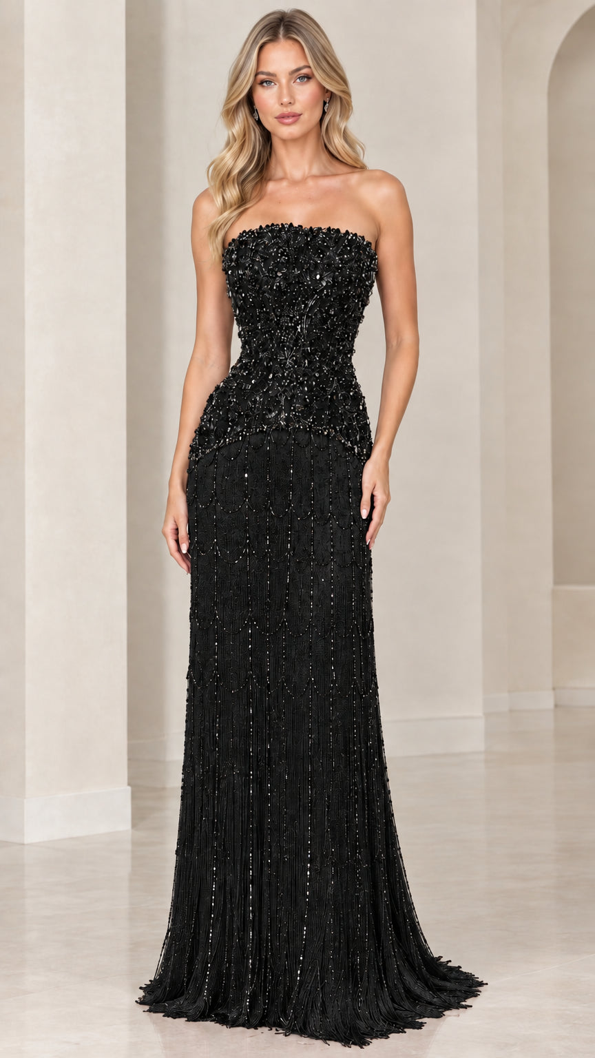Model wearing elegant black strapless beaded evening gown