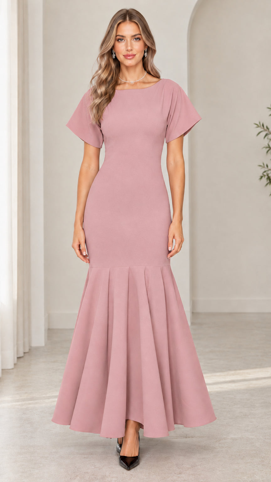 Front view of woman wearing dusty pink short sleeve mermaid evening gown