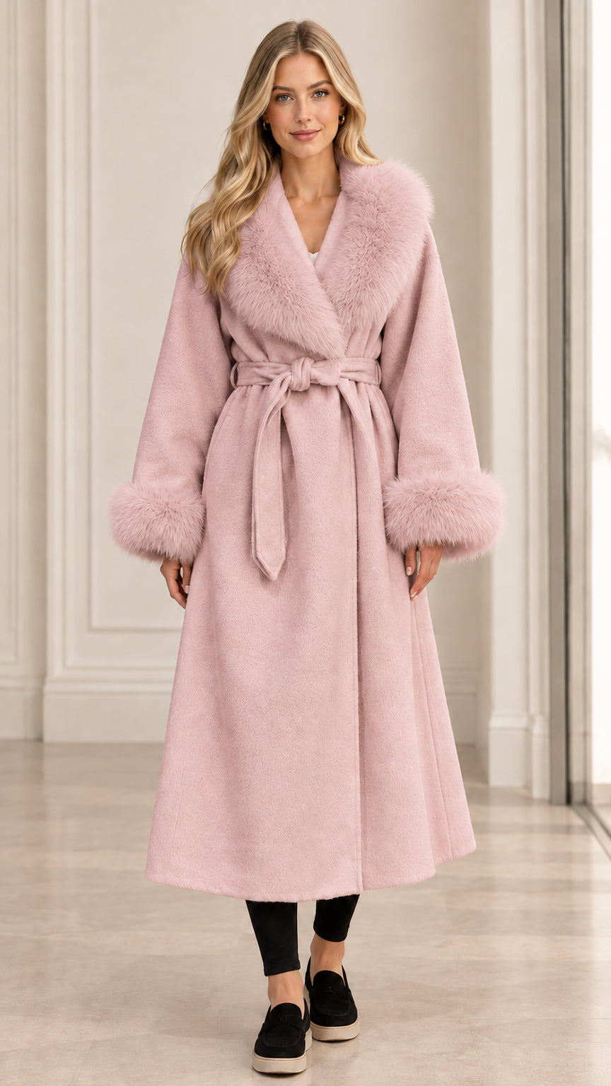 Front view of women's pastel pink belted long wrap coat with matching faux fur details