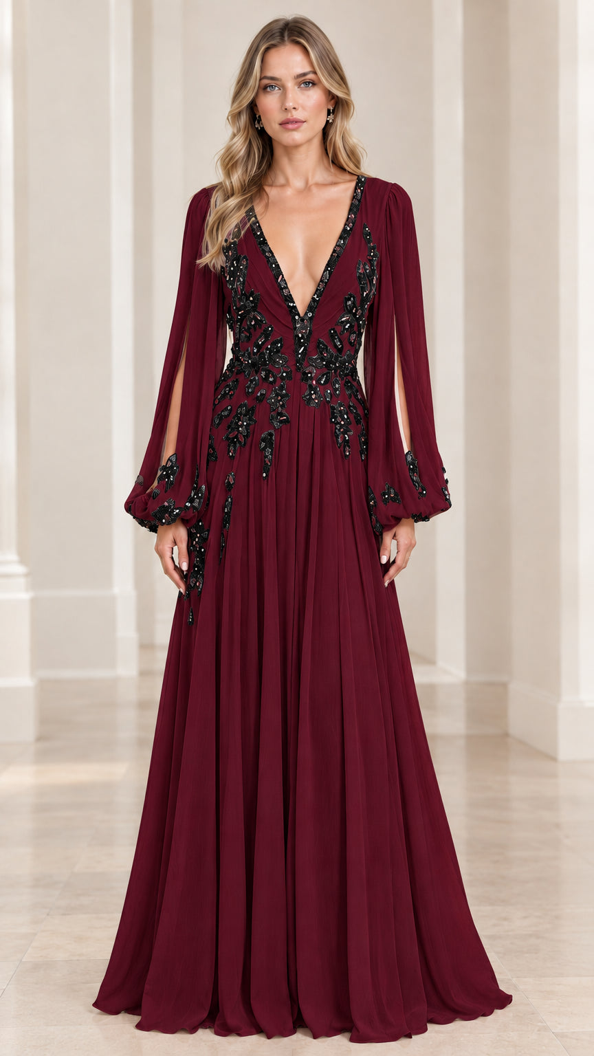 Model wearing burgundy red deep V-neck maxi evening dress with dark embroidery