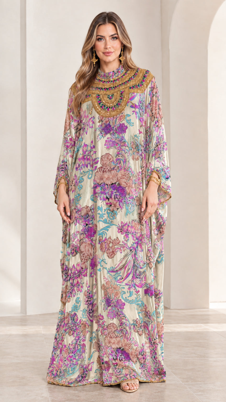 Front view of model wearing Ivory floral velvet embellished kaftan maxi dress